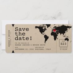 the save the date ticket is shown on a marble surface with a world map in black and white