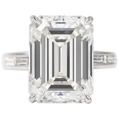 an emerald - cut diamond ring