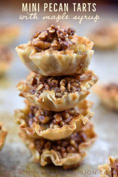 mini pecan tarts stacked on top of each other