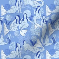 a blue and white wallpaper with two mermaids on it's back ground