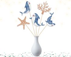 a white vase filled with sea animals and starfish