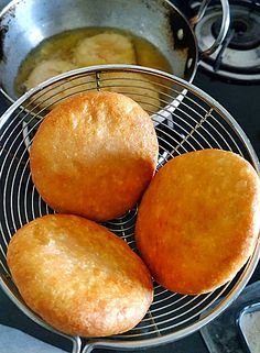 three muffins cooling in a frying pan