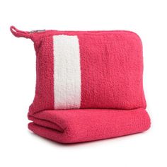 a pink and white towel folded on top of each other with a zippered closure