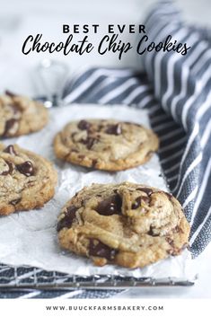 chocolate chip cookies sitting on top of a piece of parchment paper with the words best ever chocolate chip cookies