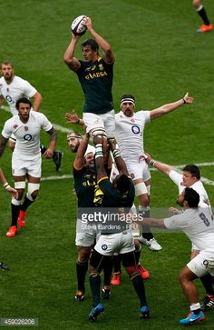 rugby players compete for the ball during a match between england and australia at twickton park