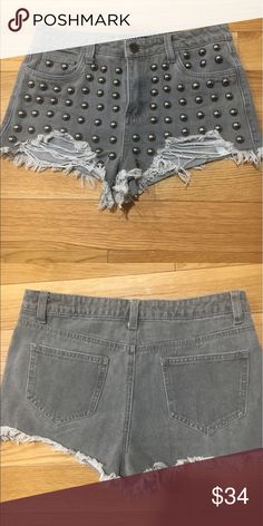 NWOT dark denim studded trendy shorts New without tags. So trendy and stylish! A statement piece. Runs small Shorts Jean Shorts Gray Jean Shorts For Summer, Trendy Gray Jean Shorts For Spring, Gray Cutoff Jean Shorts For Spring, Spring Gray Cutoff Jean Shorts, Summer Distressed Gray Bottoms, Distressed Gray Bottoms For Summer, Gray Distressed Bottoms For Summer, Gray Cutoff Jean Shorts For Summer, Mid-rise Gray Shorts For Summer