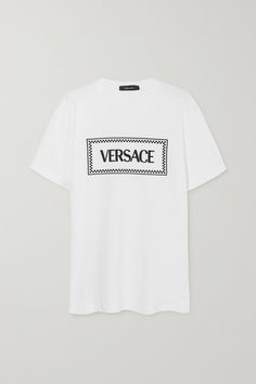 There's no mistaking Versace's T-shirt. Cut in a boxy profile from comfortable cotton-jersey, it's embroidered with the house's logo. It'll look just as cool with jeans as it will mixed in with pared-back tailoring. Versace 90s, Versace T Shirt, T Shirt Cut, Rosetta Getty, Versace Outfit, Striped Jersey, Latest T Shirt, Designer Tops, Embroidered Tshirt