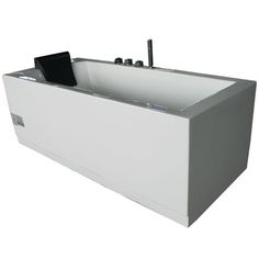 a white bath tub sitting on top of a white floor next to a black object