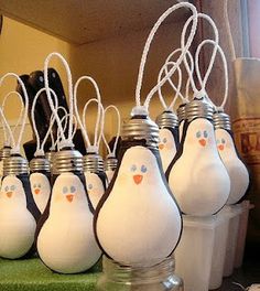 some white and black light bulbs with penguins on them