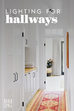 a hallway with white cabinets and an orange rug on the floor that says lighting for hallways