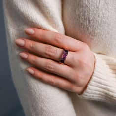 This ring is perfect for a lover of pink and purple hues! This 5 stone ring features one center pink sapphire flanked by light and dark amethyst stones set on a gold band. Embrace color and live vibrantly with this stunning ring! Available in 14K Yellow Gold Pink Sapphire weight = 0.72 carats Light and dark Amethyst weight - 2.20 carats Band width = 6.4mm and tapers to 3.4mm, based on a size 7 Gemstones are natural, therefore colors may vary Purple Pink Sapphire Promise Ring, Purple Pink Sapphire Ring With Center Stone, Fine Jewelry Pink Sapphire Ring In Purple, Purple Ruby Ring For Anniversary In Fine Jewelry Style, Purple Ruby Ring For Anniversary, Pink Sapphire Three-stone Jewelry, Pink Three-stone Sapphire Jewelry, Pink Sapphire Three Stone Jewelry, Pink Amethyst Ring In Fine Jewelry Style