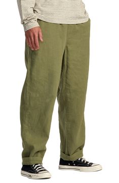 Lightweight and relaxed, these linen-blend pants feature a drawstring waist and a fit that's perfect for doing anything or just nothing. 29" inseam; 18" leg opening; 12" front rise; 16" back rise (size Medium) Elastic waist Side-seam pockets; back patch pocket 55% linen, 45% viscose Machine wash, line dry Imported Wide Leg Linen Cargo Pants For Loungewear, Linen Cargo Pants With Elastic Waistband, Linen Cargo Pants With Elastic Waistband For Loungewear, Linen Cargo Pants With Pockets For Loungewear, Elastic Waistband Linen Cargo Pants, Casual Green Linen Bottoms, Linen Cargo Pants With Elastic Waistband And Straight Leg, Straight Leg Linen Cargo Pants With Elastic Waistband, Casual Flax-colored Cotton Bottoms