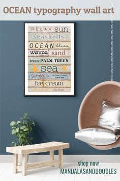 the ocean typograph wall art is displayed in a room with a swing chair