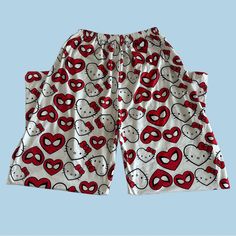 hello kitty sleep shorts with hearts all over them on a light blue background for children to wear