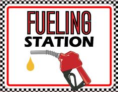 a sign that says fueling station with a gas pump at the end of it