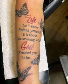 a person with a tattoo on their arm that says life isn't about finding yourself it's about discovering who god created you to be