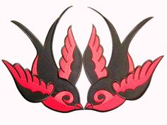 two red and black birds with wings on each side are facing opposite directions in the same direction