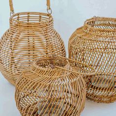 three wicker baskets sitting next to each other