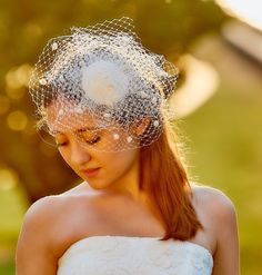 * Materials: This beautiful and elegant fascinator is made with a handmade buckram base covered with fabric and a beautiful navy blue bircage veil. *Product info: The fascinator is secured to the hair by a metalic headband. This fascinator can be made in many different colors. If you want to customize this item or you want another color that do not appear in the *variations box * contact with me . It will be my pleasure to create a custom headpiece for you. This headpiece is made with high quali Elegant Tulle Mini Hats For Wedding, Tulle Hat For Weddings And Kentucky Derby, Tulle Headband For Wedding, Whimsical Fascinator For Wedding At Royal Ascot, Wedding Costume Hats And Headpieces With Handmade Flowers, Wedding Tulle Headband, Whimsical Hat With Handmade Flowers For Wedding, Whimsical Wedding Fascinator, Adjustable Tulle Fascinator For Wedding