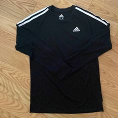 Boys Adidas Long Sleeve Sports Shirt. New Without Tags. Size M. Color Black. Black Adidas Logo T-shirt For Sports Season, Casual Long Sleeve T-shirt For Gym, Black Sporty T-shirt With Athletic Fit, Sporty Team-colored Moisture-wicking Tops, Black Activewear For Training With Team Name, Athletic Fit Long Sleeve Activewear For Sports Events, Adidas Three Stripes Crew Neck Activewear, Adidas Training Tops For Sports Season, Sportswear Long Sleeve T-shirt For Sports Season