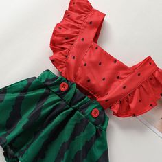 Dress your little one in the refreshing and adorable style of our Watermelon Ruffle Sleeve Baby Jumpsuit. This charming jumpsuit is perfect for the sunny days of spring and summer, adding a delightful touch to your baby's wardrobe. The jumpsuit features a vibrant watermelon print, capturing the essence of summer fun and adding a pop of color to your baby's outfit. The ruffled sleeves add a playful and feminine touch, creating a cute and fashionable look. Designed with convenience in mind, the ju Woman Costumes, Adorable Style, Jumpsuit For Kids, Watermelon Print, Boutique Items, Baby Jumpsuit, Trendy Dress, Cute Rompers, Matching Headband