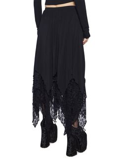 cuz it's the age of magic. This skirt has a stretchy knit construction with a lace layered hem and ruched drawstring adjustments. Skirt With Tshirt, Emo Skirt, Long Lace Skirt, Girls Midi, Rave Shoes, Gothic Skirt, Ruched Midi Skirt, Skirt With Lace