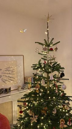 a decorated christmas tree in a living room