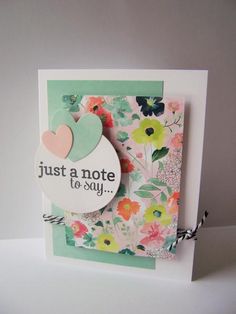 a card with flowers on it that says, just a note to say and a heart