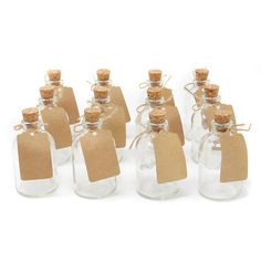 small glass bottles with corked top and tags