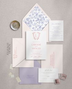 the wedding stationery is laid out and ready to be used as an additional piece of paper