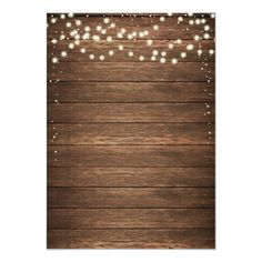 a wooden background with lights on it