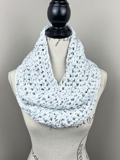 Crochet infinity scarf Yarn: 97 % acrylic 3% other fiber  Length is 60 inches  Width is 5 inches  Colors: white tweed (I) Care Instructions: hand wash and lay flat to dry. Cozy White Scarves One Size, Crochet Scarf Infinity, Chunky Knit Scarf, Chunky Knit Scarves, Scarf Infinity, Scarf Yarn, Crochet Infinity Scarf, Chunky Scarves, White Tweed