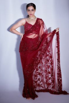 Maroon saree with floristry, sequin embroidery. Paired with blouse and petticoat.
Component: 3
Pattern: Embroidery
Type Of Work: Floristry, sequin
Neckline: Leaf neck
Sleeve Type: Sleeveless
Fabric: Tulle
Color: Maroon
Other Details: 
Jaal pattern on blouse
Sheer panelled pallu
Occasion: Reception - Aza Fashions Net Saree Blouse Designs, Party Wear Sarees Online, Maroon Saree, Indian Bridesmaid Dresses, Indian Wedding Gowns, Cotton Blouse Design, Tulle Embroidery, Traditional Indian Dress, Indian Fashion Saree