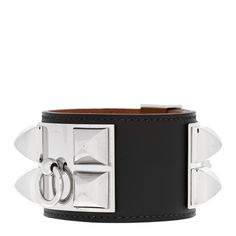 This is an authentic HERMES Box Collier De Chien CDC Bracelet S in Chocolate. This chic dog collar bracelet is crafted of smooth calfskin leather in dark chocolate brown, and features a polished palladium silver studded panel with a ring and a studded clasp. Hermes Cdc Bracelet, Luxury Leather Cuff Jewelry, Designer Silver Leather Bracelet With Palladium Hardware, Luxury Leather Cuff Bracelets, Luxury Leather Bracelet With Palladium Hardware For Formal Occasions, Luxury Silver Leather Bracelet With Palladium Hardware, Designer White Gold Leather Jewelry, Hermes Bracelet, Hermes Jewelry