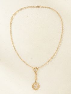 Designed to symbolize true love, Foundrae's necklace will be a special gift for your soulmate,. Handmade from glinting 18-karat gold, it’s strung on a belcher chain with an nautical medallion. It's cornered with scintillating diamonds. Gold-tone Clavicle Chain Jewelry For Wedding, Elegant Diamond Necklace With Chain As A Gift, Timeless Clavicle Chain Pendant Jewelry, Timeless Clavicle Pendant Necklace, White Gold Recycled Gold Pendant Necklace, Timeless Yellow Gold Necklace With Lobster Clasp, Gold Plated Chain Necklaces For Wedding, Yellow Gold Recycled Gold Initial Pendant Necklaces, Luxury Gold Plated Necklaces With Lobster Clasp