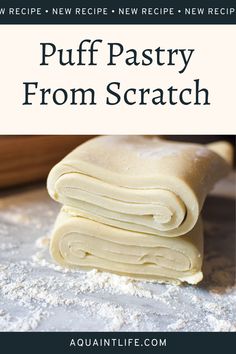 the recipe for puff pastry from scratch is shown in front of a stack of rolled up dough