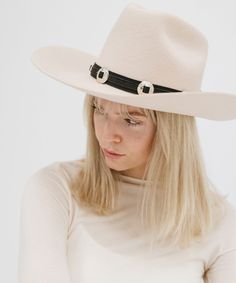 Add a touch of western vibes to any of your Gigi Pip looks! Whether you're looking to trim a traditional western style hat or a simply classic silhouette, adding the Genuine Leather Western Band to your look gives just enough to acknowledge country vibes while still having the ability to be versatile + vibe with any style you're channeling that day. + Pro Tip: Layer different band textures, colors + widths together to create your ultimate band stack! There are no rules when it comes to trimming Western Brimmed Fedora For Fall, Western Style Brimmed Fedora For Fall, Western Style Curved Brim Fedora For Fall, Western Fedora For Kentucky Derby At Ranch, Elegant Felt Hat For Rodeo In Fall, Elegant Felt Hat For Rodeo And Fall, Western Style Flat Brim Felt Hat For Rodeo, Western Wide Brim Fedora, Western Felt Hat With Flat Brim For Rodeo