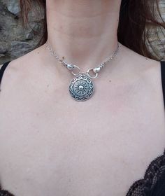 Antique silver viking shieldmaiden shield with hands choker necklace with stainless steel chain, charming and unique. PLEASE read my shop announcement before placing an order so you know what to expect right now. Plus, when ordering from outside Europe, don't forget to provide a phone number for the courier to ensure the fastest and smoothest delivery More warrior and viking jewelry this way. Take a look! They're stunning and magical: https://www.etsy.com/shop/ValkyriesSong?ref=seller-platform-mcnav&search_query=warrior https://www.etsy.com/shop/ValkyriesSong?ref=seller-platform-mcnav&section_id=24225925 Stainless steel chain and findings, won't rust or anything  Fastens with a solid lobster clasp, and has an extension chain. All my jewelry is nickel and lead free.  I'm so sorry for having Viking Shieldmaiden, Viking Shield Maiden, Woman Hands, Necklace Woman, Viking Shield, Shield Maiden, Hand Necklace, Viking Necklace, Necklace Antique