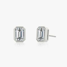 The Bezel Solitaire Studs combine vintage-inspired detail and modern appeal together for a look that’s timelessly elegant. Classic White Gold Earrings With Timeless Design, Classic White Gold Earrings, Classic Sterling Silver Earrings With Timeless Design, Classic Diamond Earrings With Polished Finish For Formal Events, Classic Diamond Earrings With Polished Finish For Formal Occasions, Classic Formal Diamond Earrings With Polished Finish, Elegant Octagon 14k Gold Earrings, Classic Jewelry With Emerald Cut Bezel Setting, Classic Emerald Cut Jewelry With Bezel Setting