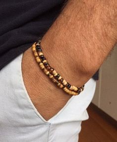 "Mens wooden bracelet set. Surfer bracelet men. Coconut bead bracelet for men. Miyuki wood stretch bracelet. Stacking bracelet set for women. These striking bracelets will make a great addition to your wrist game. The price is for a set of two bracelets. Each bracelet in this mens surfer bracelet set is separately available. - coconut wood beaded bracelet: https://www.etsy.com/listing/832643488/slim-coconut-bracelet-for-men-mens?ref=shop_home_active_4&pro=1&frs=1 - randomly strung coconut wood & Mens Stretch Bracelets, Bead Bracelet For Men, Mens Bracelet Set, Boys Bracelets, Surf Jewelry, Surfer Bracelets, Wood Bead Bracelet, Bracelet Stacking, Boys Jewelry