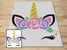 a white rug with a unicorn face on it