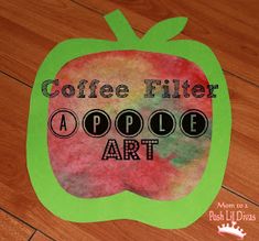 coffee filter apple art project for kids to do on the floor with paper and glue