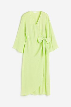 Calf-length dress in jacquard-weave fabric. V-shaped neckline and wrapover front with wide ties at one side and narrow  concealed ties at other side. Dropped shoulders and long  wide sleeves. Unlined. Green Wrap Dress, Green Wrap, Dress H&m, Calf Length Dress, Woven Wrap, Weave Fabric, H&m Women, Jacquard Weave, Dress Form