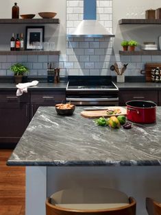 the kitchen counter is clean and ready for us to use in its cooking process,