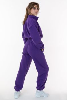 The Flex Fleece High Waist Sweatpant. This unisex pant features an adjustable drawstring and an elastic hem at the ankle. This fleece is soft and comfortable. Perfect for post workout, lounging at home or a trip to the grocery store. Pair with a bodysuit or crop top for a casual look or go bold with the matching Flex Fleece Half Zip Cropped Pullover. These sweatpants feature a high waist fit that accentuates your curves juxtaposed with a super baggy leg width. Constructed from 50% polyester and 80s Loungewear, La Outfits, Cropped Pullover, Colored Pants, Sweaters And Leggings, Post Workout, Cotton Fleece, Grocery Store, Sweater Jacket