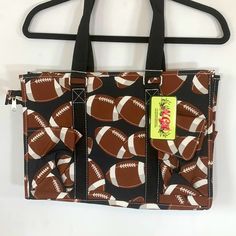 Quantity 2 For $35.00, New In Bags Football Themed Tote/Shopping/Travel/Storage/Craft Bags, Size: 15.5x10.5x6, Color: Brown Black, Top Zipper Closure, Handle Drop 10 Inches, Side Mesh Pockets, One Side 2 Slip Pockets, Other Side Has 1 Slip Pocket & 1 Velcro Flap Closure Pocket, Wipe Clean Interior, Brand New Condition Brown Bags With Cell Phone Pocket For School, Brown School Bags With Cell Phone Pocket, Black Bag With Cell Phone Pocket For Shopping, Black Shopping Bag With Cell Phone Pocket, Brown Shopping Bag With Cell Phone Pocket, Brown Satchel Diaper Bag With Large Capacity, Large Capacity Brown Satchel Diaper Bag, Brown Tote Diaper Bag For Daily Use, Large Capacity Brown Rectangular Diaper Bag