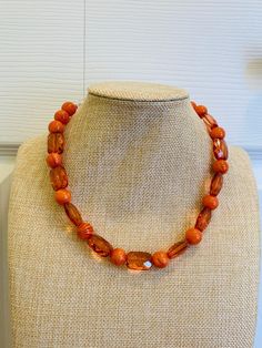 The necklace is 18 inches and comes with 3-inch extender Orange is a fun color for all seasons Round beads are acrylic and 12mm Crystals are 8MM Orange Squares are acrylic Festive Orange Round Beads Necklace, Handmade Orange Crystal Necklaces With Round Beads, Orange Round Beaded Colorful Necklaces, Orange Large Beads Necklace For Party, Vibrant Orange Round Bead Jewelry, Orange Squares, Single Necklace, Multicolor Bracelet, Gold Glitter Confetti