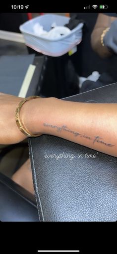 a woman's arm with writing on it