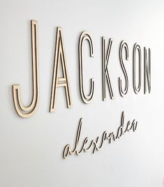 the name jackson is made out of wood letters