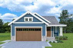 a blue house with two garages on the front and one above the garage door